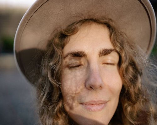 smiling woman testimonial about mindfulness journey